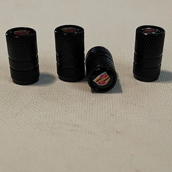 Cadillac Valve Stem Caps in Black set of 4 NWT - Picture 1 of 5